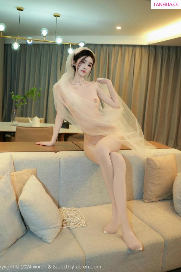   [XiuRen]高清写真图 2024.12.27 No.9674 Erikaki 情趣婚纱第2张图片